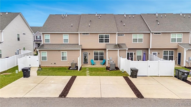 6177 Bowline Ln, Richmond, VA 23234 - rear view of house with a gate, a fenced backyard, a patio area, and a residential view