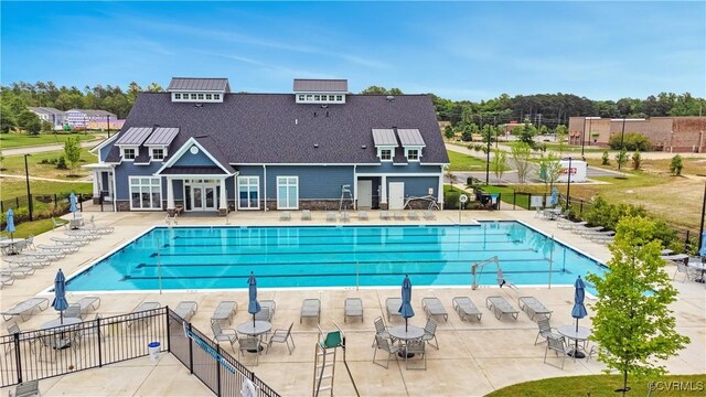 6177 Bowline Ln, Richmond, VA 23234 - community pool with french doors, a patio area, and view of wooded area