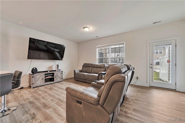 6177 Bowline Ln, Richmond, VA 23234 - living area featuring light wood finished floors and baseboards