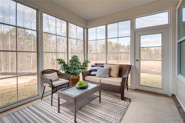 sunroom / solarium with an outdoor living space