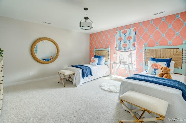 bedroom with carpet flooring, baseboards, and visible vents