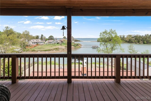 wooden terrace with a water view