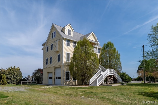 exterior space featuring stairway and an attached garage