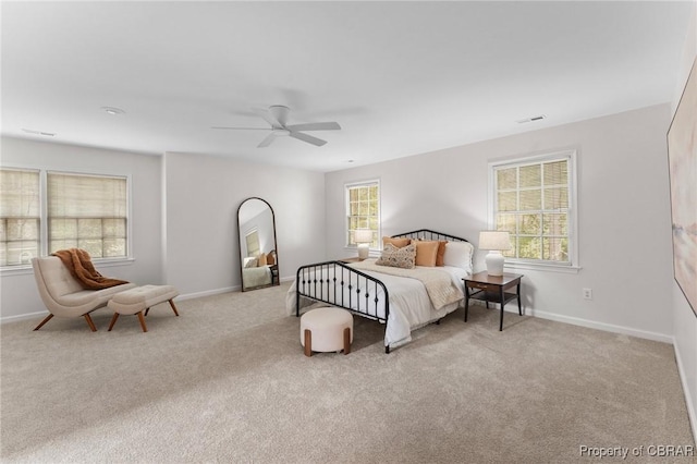 bedroom featuring carpet flooring, baseboards, and a ceiling fan