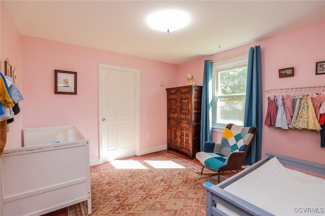 bedroom with baseboards