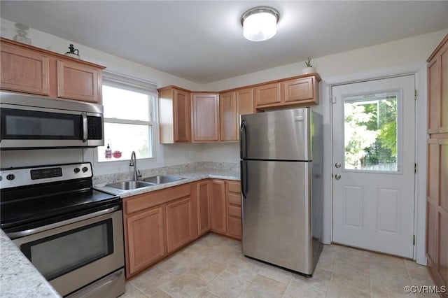 kitchen with stainless steel appliances and a sink