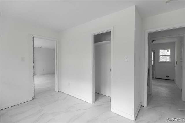 233 Christopher Wren Rd, Williamsburg, VA 23185 - unfurnished bedroom with light marble finish floors and baseboards