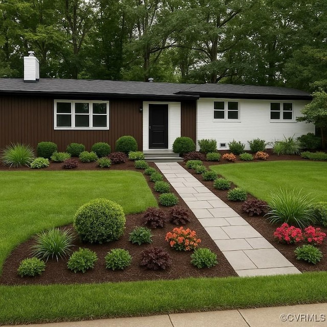 233 Christopher Wren Rd, Williamsburg, VA 23185 - view of front of home featuring a front lawn, a chimney, and board and batten siding