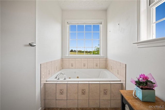 full bathroom featuring a whirlpool tub