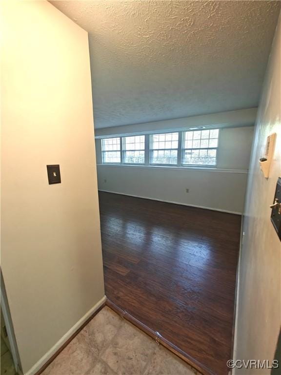 7701 Okeith Ct Unit 1601, Henrico, VA 23228 - unfurnished room with plenty of natural light and a textured ceiling