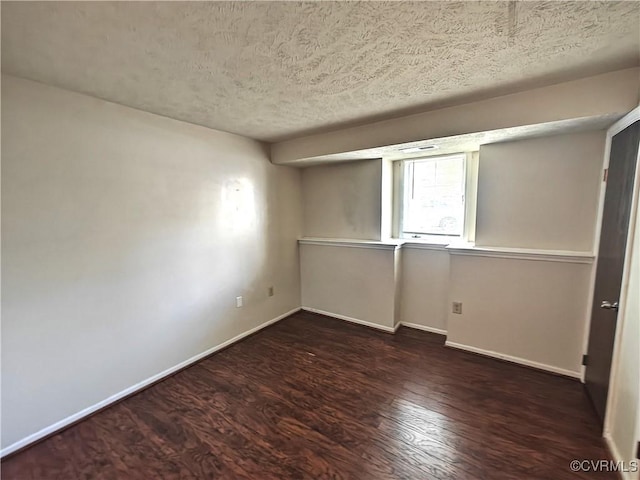 7701 Okeith Ct Unit 1601, Henrico, VA 23228 - unfurnished bedroom with wood finished floors and a textured ceiling