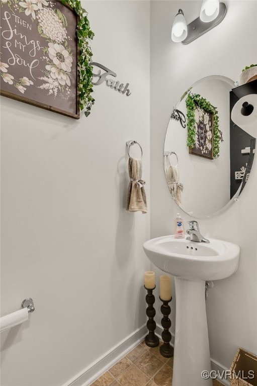 bathroom featuring baseboards