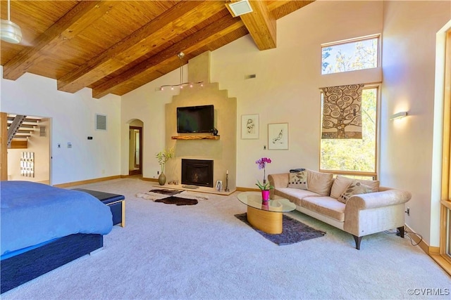 interior space featuring high vaulted ceiling, wood ceiling, and carpet floors