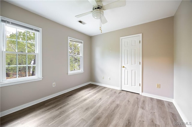 3012 Appleford Dr, Chester, VA 23831 - empty room featuring visible vents, light wood-style flooring, a ceiling fan, and baseboards