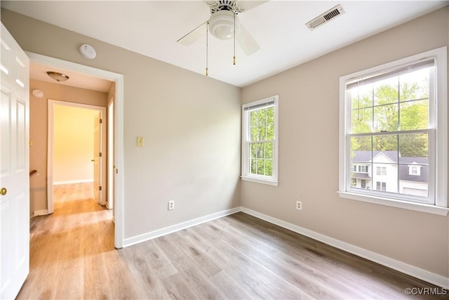 3012 Appleford Dr, Chester, VA 23831 - spare room with visible vents, ceiling fan, light wood finished floors, and baseboards