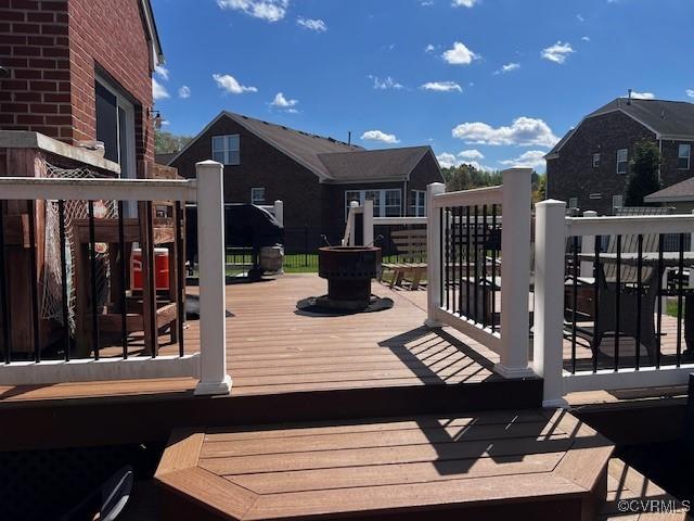 502 Peafowl Ct, Suffolk, VA 23435 - wooden deck featuring a residential view