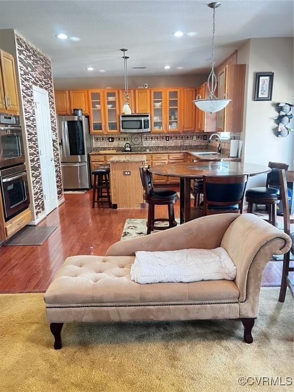 502 Peafowl Ct, Suffolk, VA 23435 - living area with dark wood-style flooring and recessed lighting