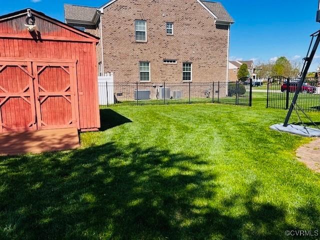 502 Peafowl Ct, Suffolk, VA 23435 - view of yard with central AC unit