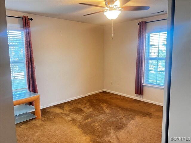 502 Peafowl Ct, Suffolk, VA 23435 - carpeted spare room with ceiling fan and baseboards
