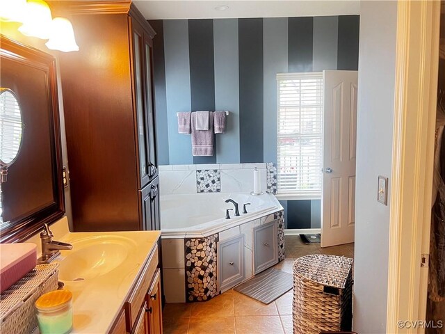 502 Peafowl Ct, Suffolk, VA 23435 - full bath with tile patterned floors, a garden tub, vanity, and baseboards