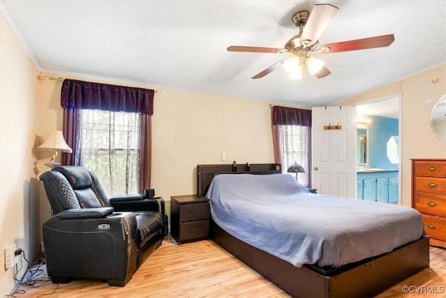 10340 Swift Rd, Partlow, VA 22534 - bedroom featuring crown molding, light wood-type flooring, lofted ceiling, ceiling fan, and ensuite bath