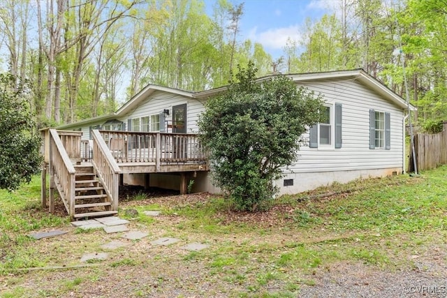 10340 Swift Rd, Partlow, VA 22534 - back of property featuring crawl space, a wooden deck, and stairs
