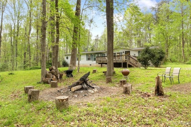 10340 Swift Rd, Partlow, VA 22534 - view of green lawn with a wooden deck and stairway