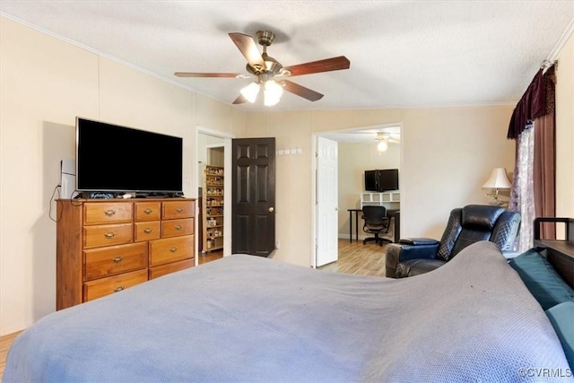 10340 Swift Rd, Partlow, VA 22534 - bedroom with light wood-style flooring, crown molding, and ceiling fan