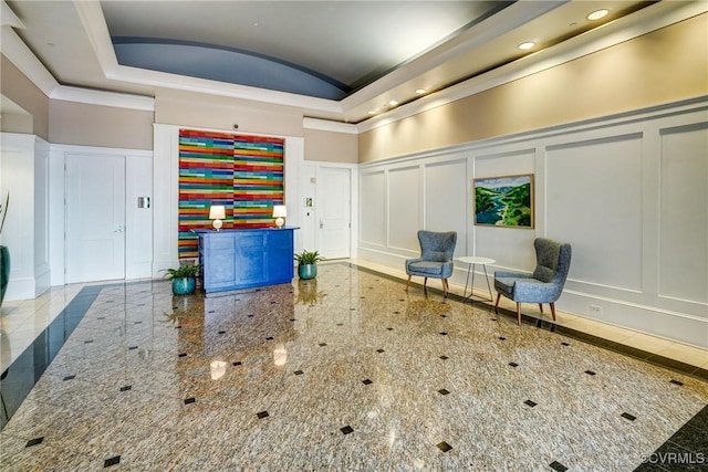 1101 Haxall Pt Unit U810, Richmond, VA 23219 - welcome area with a decorative wall, vaulted ceiling, wainscoting, and recessed lighting