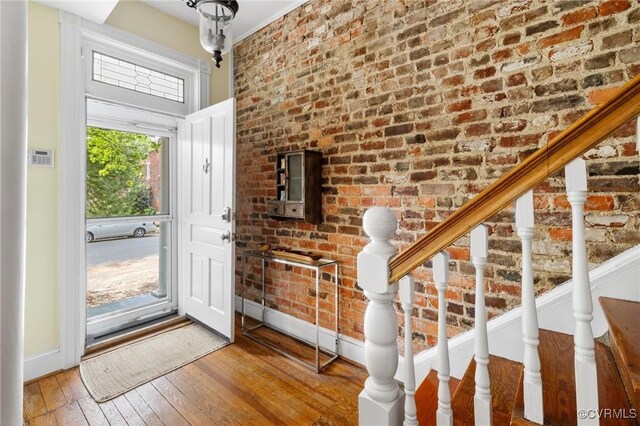 116 N 29th St, Richmond, VA 23223 - entryway with stairs, hardwood / wood-style flooring, and baseboards