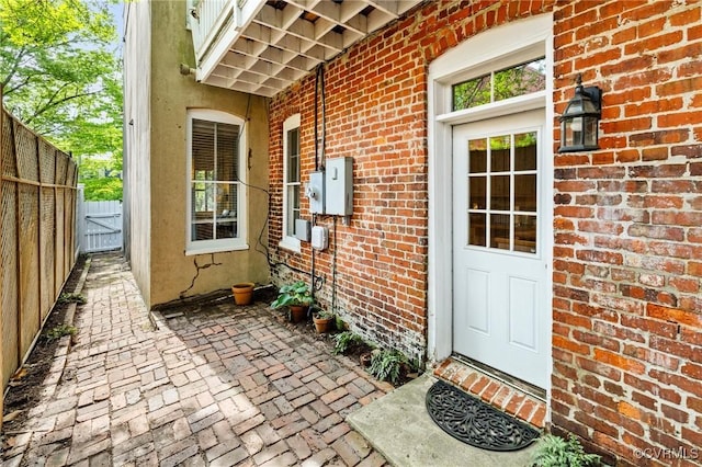 116 N 29th St, Richmond, VA 23223 - entrance to property featuring fence, a gate, and brick siding