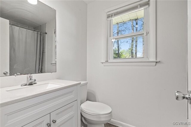 2230 Lancers Blvd, Chesterfield, VA 23224 - full bathroom featuring toilet, vanity, and a shower with curtain