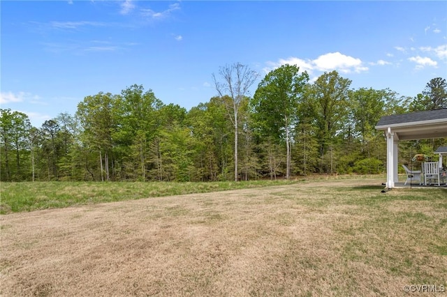 8106 W Danube Loop, New Kent, VA 23124 - view of green lawn with a view of trees