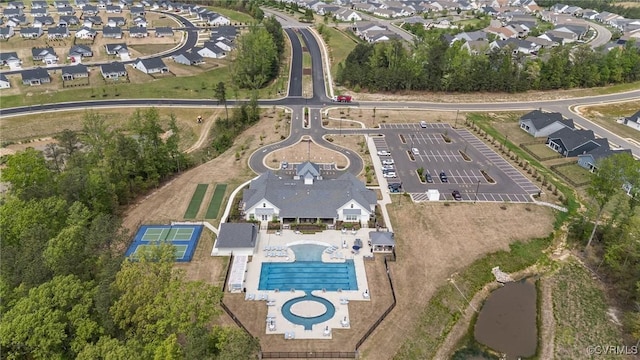 8106 W Danube Loop, New Kent, VA 23124 - aerial view of property and surrounding area featuring nearby suburban area and a pool area