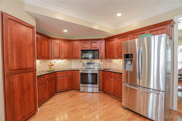 kitchen with crown molding, dark countertops, appliances with stainless steel finishes, and tasteful backsplash
