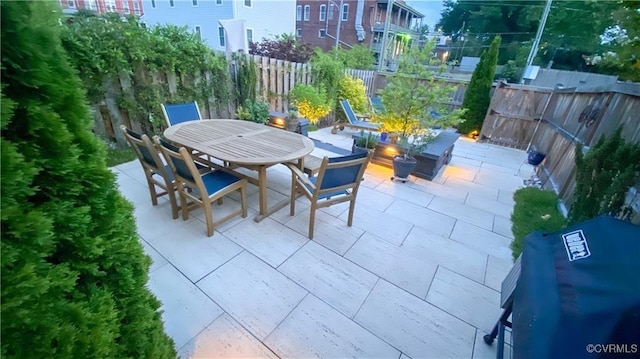2611 Kensington Ave, Richmond, VA 23220 - view of patio / terrace with outdoor dining space, area for grilling, and a fenced backyard