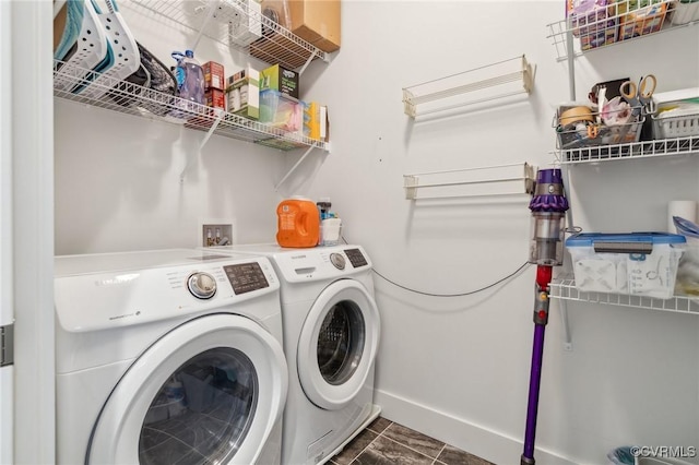 2611 Kensington Ave, Richmond, VA 23220 - laundry room with washing machine and dryer, baseboards, and laundry area