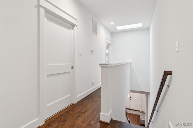 2611 Kensington Ave, Richmond, VA 23220 - corridor featuring recessed lighting, visible vents, an upstairs landing, dark wood-type flooring, and a skylight