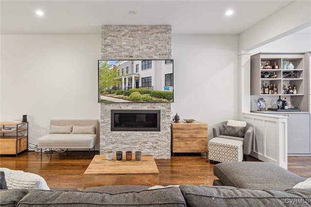 2611 Kensington Ave, Richmond, VA 23220 - living area with a fireplace, wood finished floors, and recessed lighting