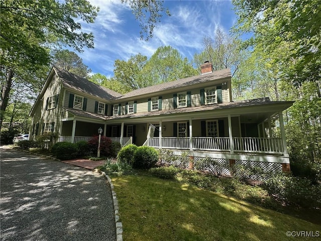 328 Perrow Ln, Manakin Sabot, VA 23103 - colonial home with a front yard, covered porch, and a chimney