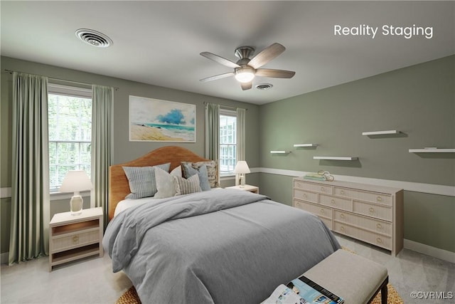 328 Perrow Ln, Manakin Sabot, VA 23103 - bedroom featuring visible vents, baseboards, ceiling fan, and multiple windows