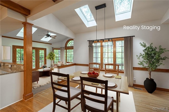328 Perrow Ln, Manakin Sabot, VA 23103 - dining room featuring plenty of natural light, light wood-style flooring, baseboards, and a skylight