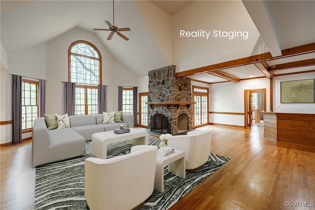 328 Perrow Ln, Manakin Sabot, VA 23103 - living area with high vaulted ceiling, a fireplace, a ceiling fan, and wood finished floors