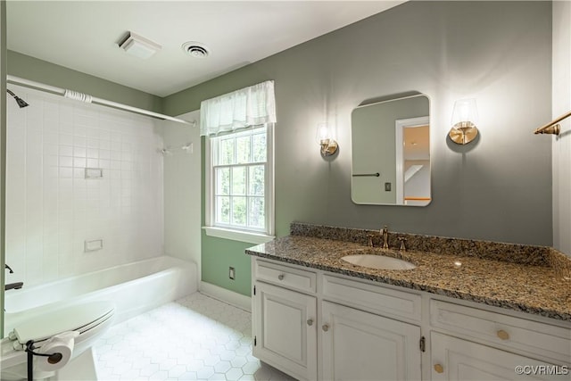 328 Perrow Ln, Manakin Sabot, VA 23103 - bathroom featuring tile patterned flooring, vanity, shower / bathtub combination, toilet, and baseboards