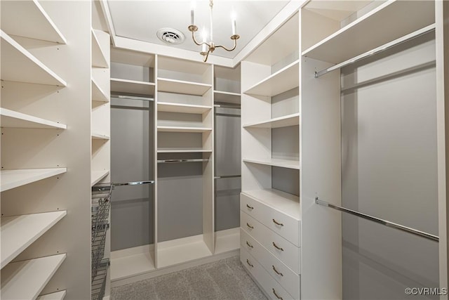 328 Perrow Ln, Manakin Sabot, VA 23103 - spacious closet featuring a notable chandelier and visible vents