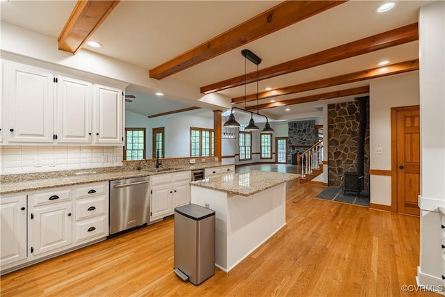 328 Perrow Ln, Manakin Sabot, VA 23103 - kitchen with light wood-type flooring, a sink, dishwasher, and white cabinets