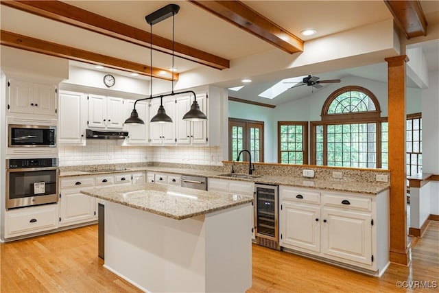 328 Perrow Ln, Manakin Sabot, VA 23103 - kitchen featuring ceiling fan, a sink, stainless steel appliances, wine cooler, and under cabinet range hood