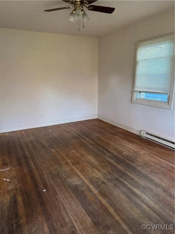 2502 Redwood Ave, Richmond, VA 23223 - empty room with a baseboard heating unit, ceiling fan, baseboards, and dark wood finished floors