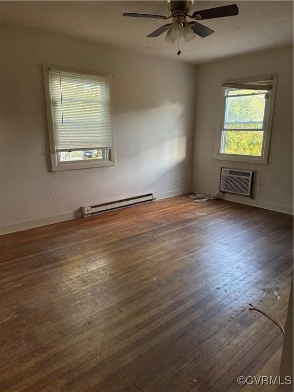 2502 Redwood Ave, Richmond, VA 23223 - empty room featuring baseboards, a wall unit AC, ceiling fan, wood-type flooring, and a baseboard radiator