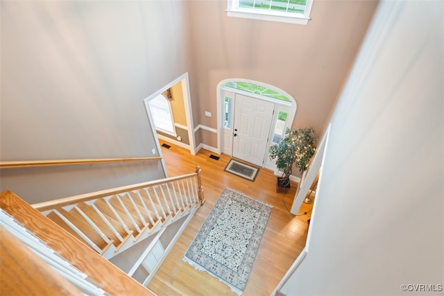 12419 Trumpington Ct, Chesterfield, VA 23838 - entrance foyer with visible vents, wood finished floors, baseboards, and a high ceiling